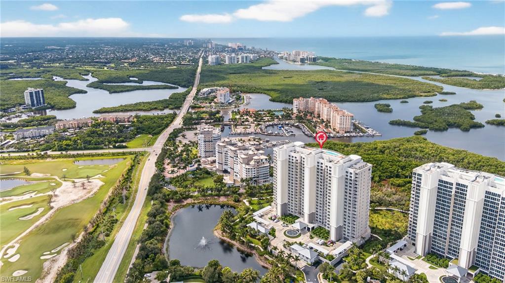 13915 Old Coast Road, Unit 1503 Naples, FL 34110 - Photo 31 of 49 a view of a city with an ocean view