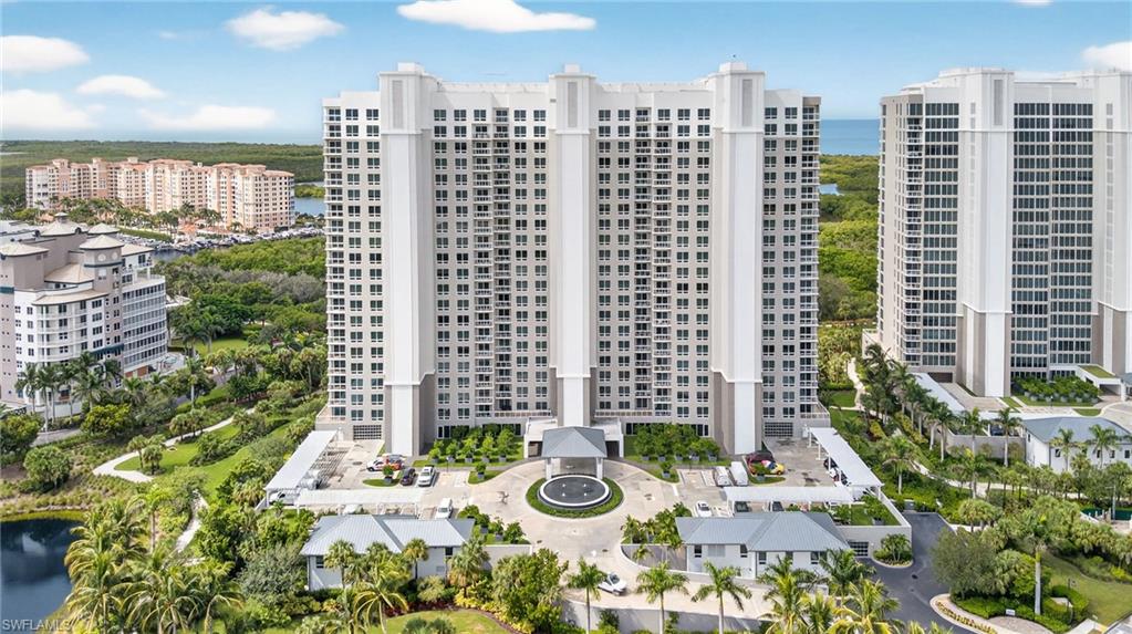 13915 Old Coast Road, Unit 1503 Naples, FL 34110 - Photo 40 of 49 a view of a city with tall buildings
