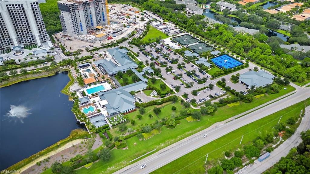 13915 Old Coast Road, Unit 1503 Naples, FL 34110 - Photo 41 of 49 view of a lake with an outdoor seating