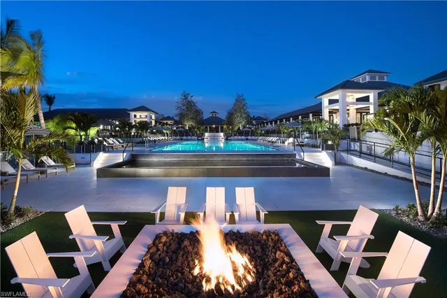 a view of a chairs and table in the patio