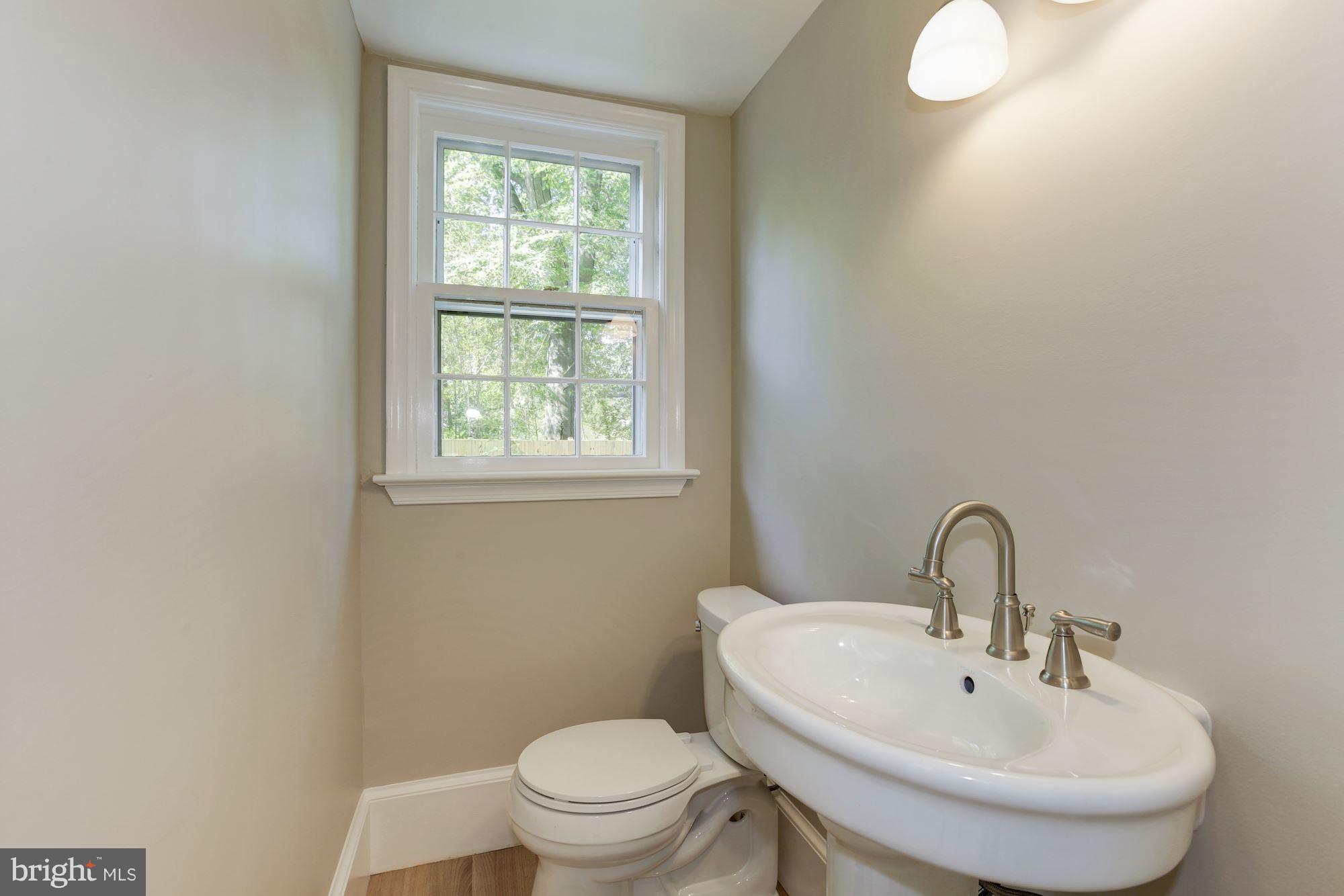 9914 Woodburn Road Silver Spring, MD 20901 - Photo 12 of 28 Main Level Powder Room