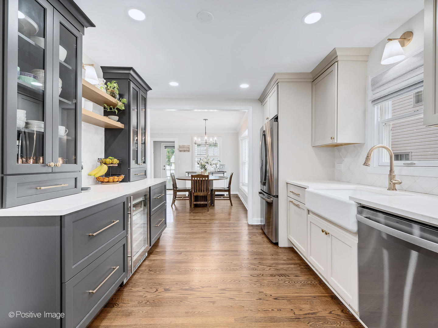 637 South Prospect Avenue Elmhurst, IL 60126 - Photo 13 of 37 a kitchen with stainless steel appliances a sink stove and cabinets