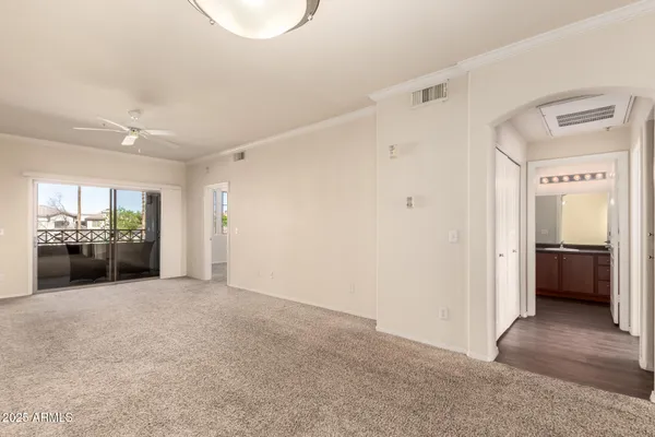 a kitchen with a refrigerator and a sink