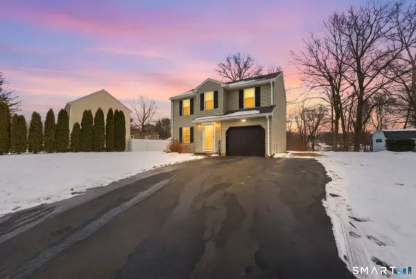 a view of road with a building in the background