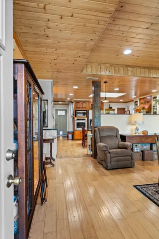 a large room with lots of furniture and appliances