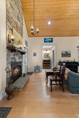 a kitchen with stainless steel appliances granite countertop a sink and a stove