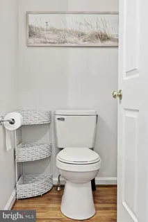 a bathroom with a toilet and a sink