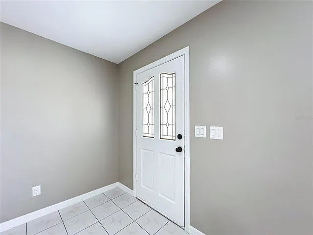 a view of an empty room with window