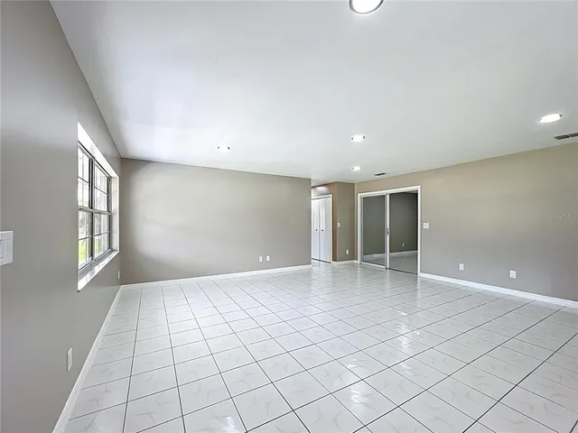 a view of an empty room with window