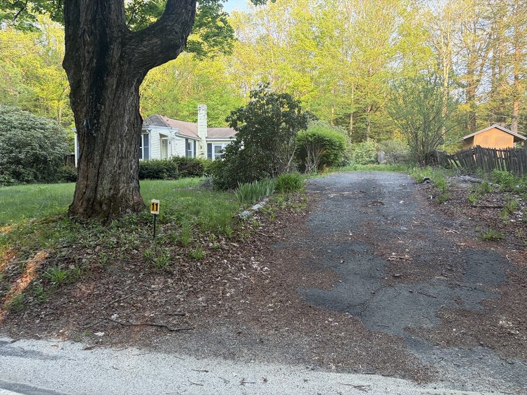 11 South Chesterfield Road Goshen, MA 01096 - Photo 2 of 30 a view of a house with a yard
