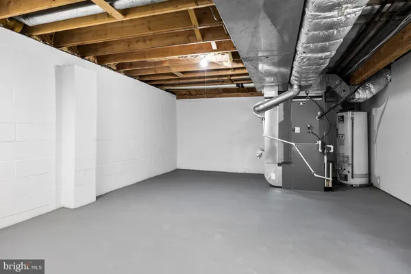 a view of an empty room with stairs