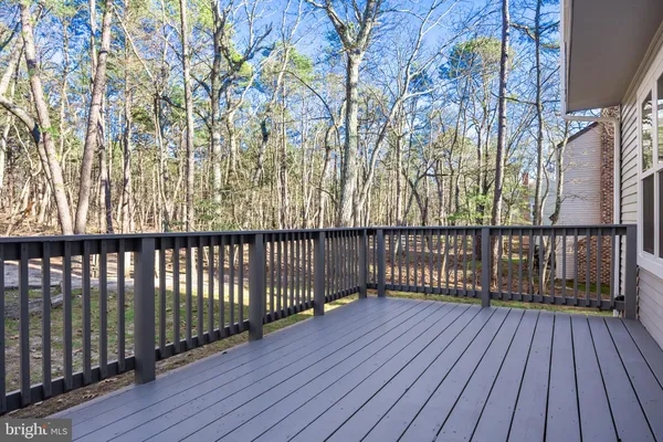 a view of wooden balcony with wooden floor