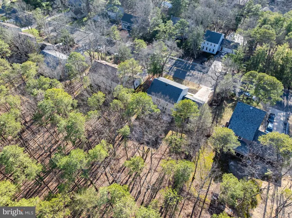 an aerial view of house with yard