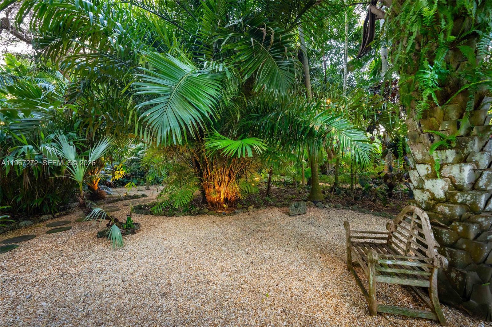 4867 Southwest 82nd Street Miami, FL 33143 - Photo 17 of 69 a view of a park with a bench and trees