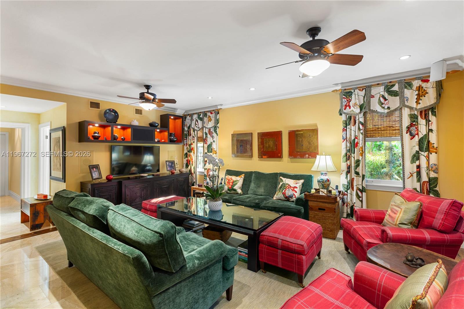 4867 Southwest 82nd Street Miami, FL 33143 - Photo 28 of 69 a living room with furniture and a chandelier