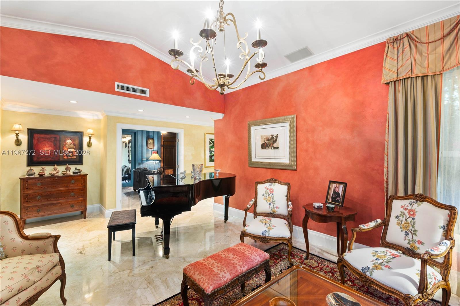 4867 Southwest 82nd Street Miami, FL 33143 - Photo 48 of 69 a living room with furniture a chandelier and a window