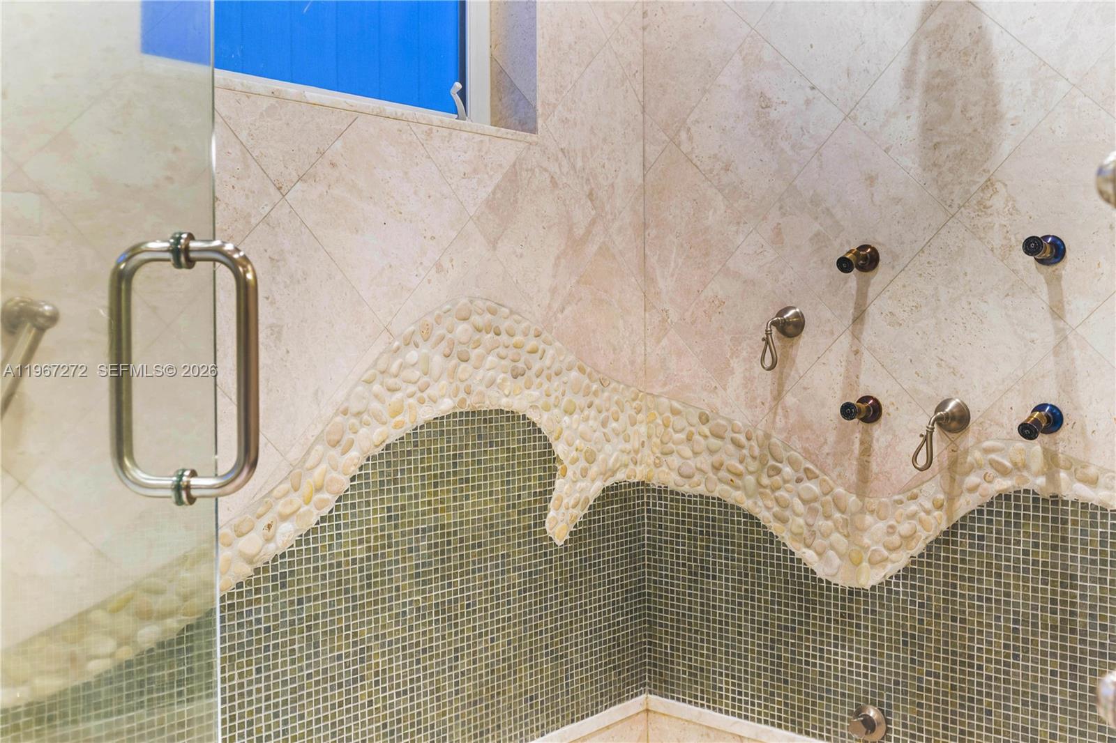 4867 Southwest 82nd Street Miami, FL 33143 - Photo 51 of 69 a bathroom with a shower