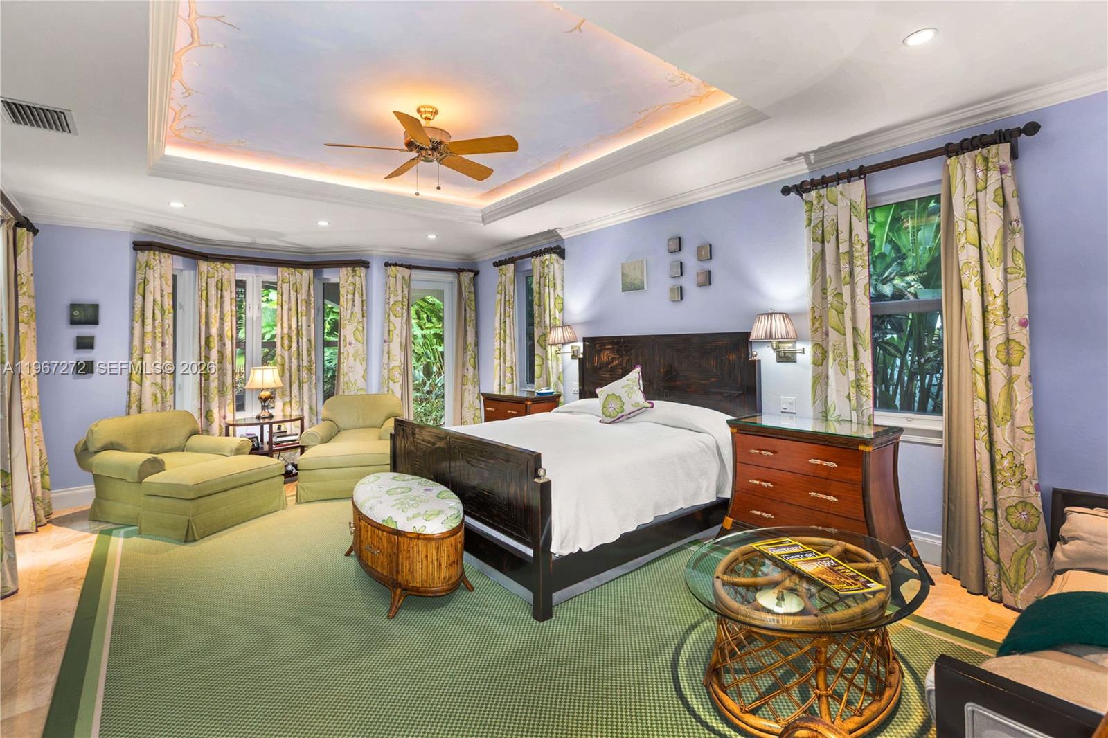 4867 Southwest 82nd Street Miami, FL 33143 - Photo 56 of 69 a spacious bedroom with a bed and a large window