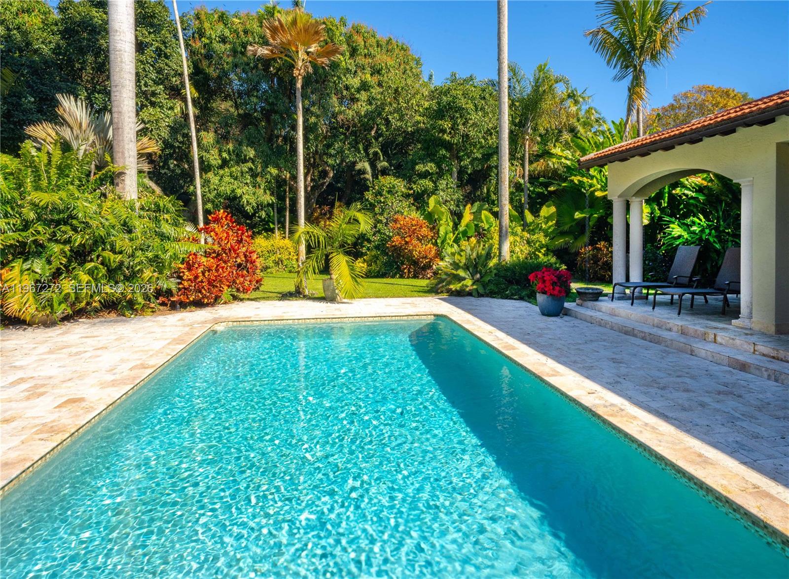 4867 Southwest 82nd Street Miami, FL 33143 - Photo 6 of 69 a view of a backyard with plants and a patio
