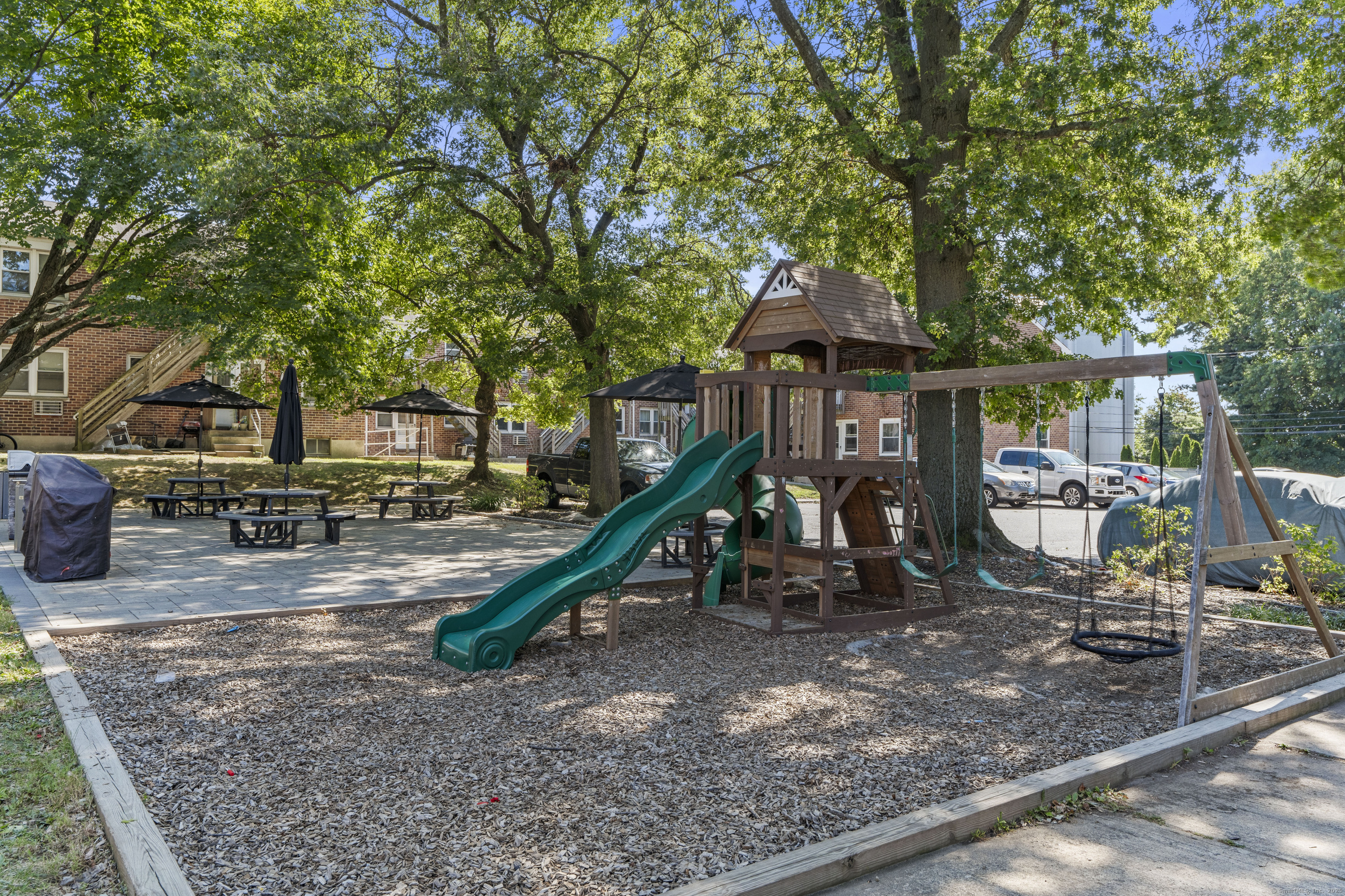 146 Blachley Road, Unit C Stamford, CT 06902 - Photo 33 of 44 a view of a slide with a slide