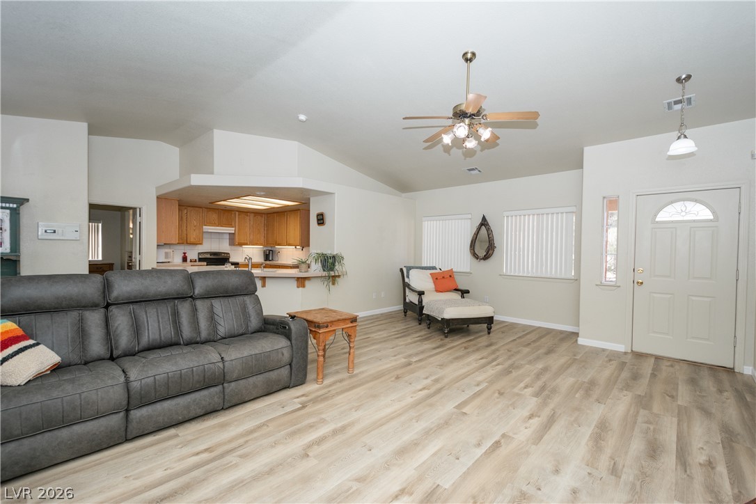 2381 Tough Boy Road Pahrump, NV 89060 - Photo 19 of 44 Bright and airy living area featuring a functional kitchen pass-through.