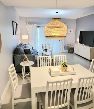 a view of a dining room with furniture