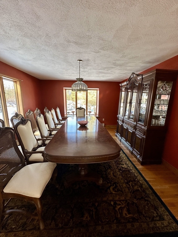 42 Pine Acres Road Foxboro, MA 02035 - Photo 21 of 40 a view of a dining room with furniture