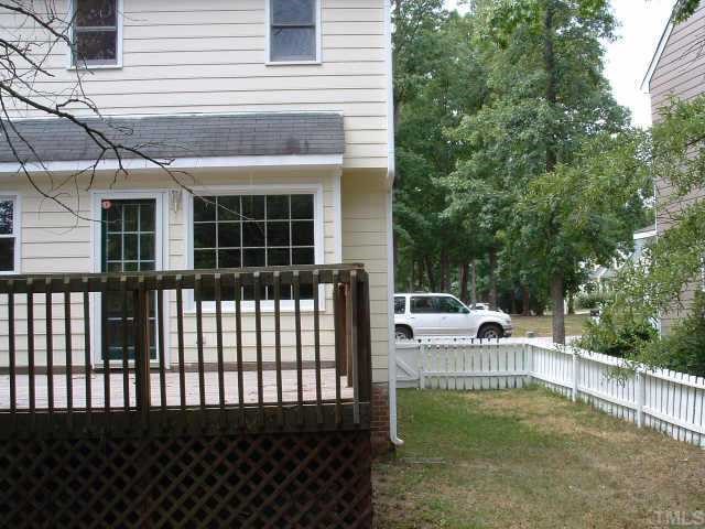 4641 Draper Road Raleigh, NC 27616 - Photo 9 of 9 a view of a house with a wooden fence