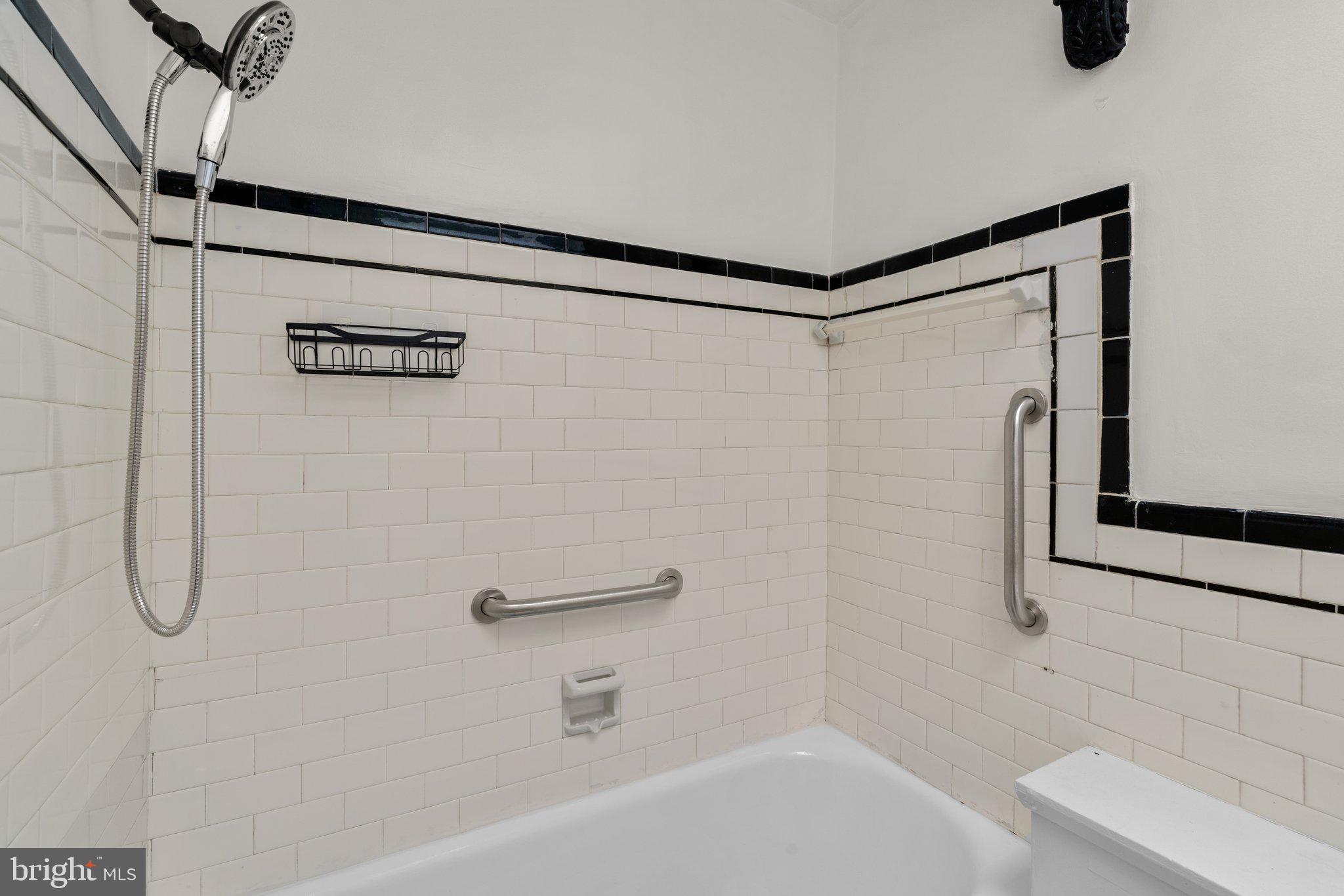 4208 Sheldon Avenue Baltimore, MD 21206 - Photo 14 of 26 a bathroom with a shower