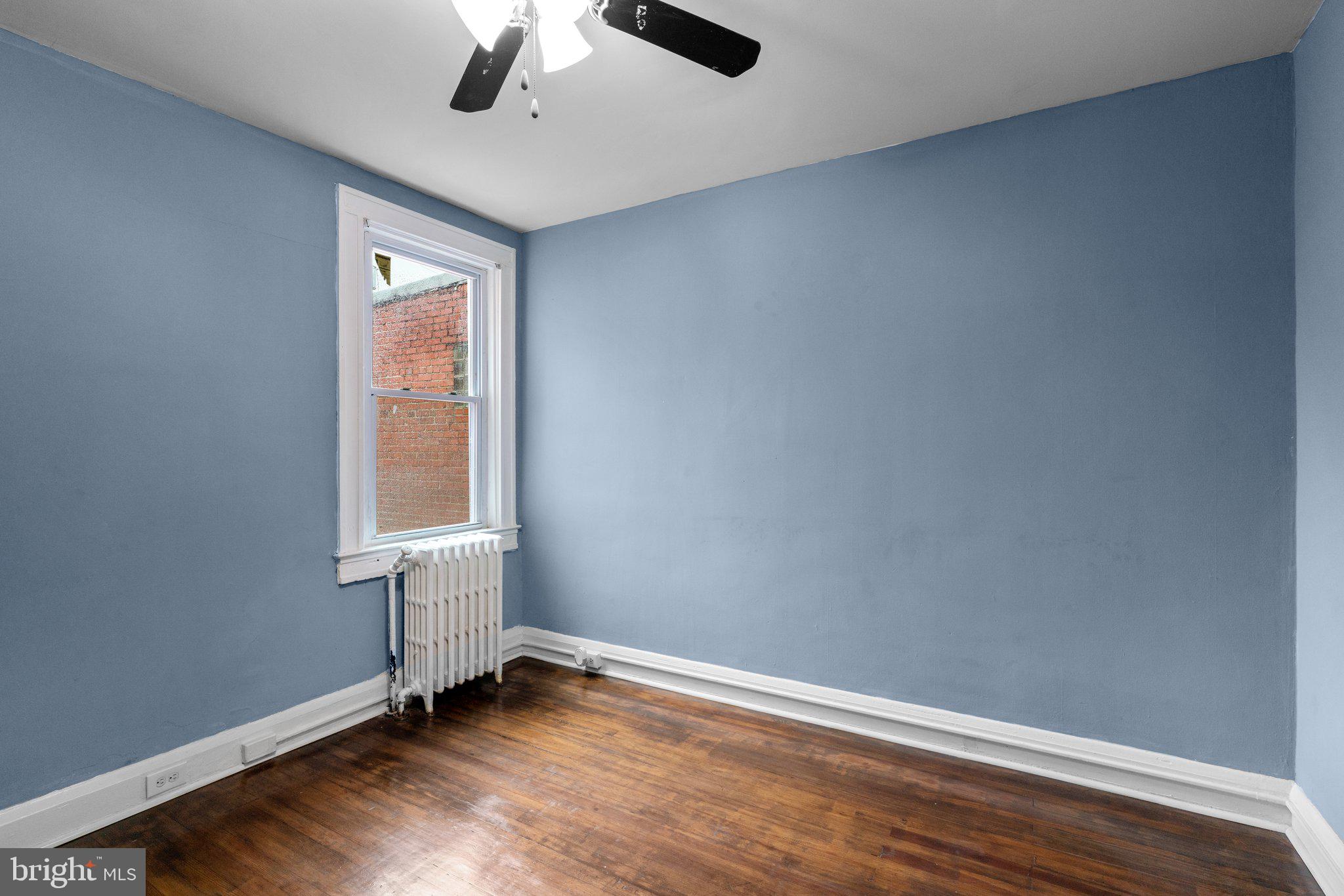 4208 Sheldon Avenue Baltimore, MD 21206 - Photo 15 of 26 an empty room with windows