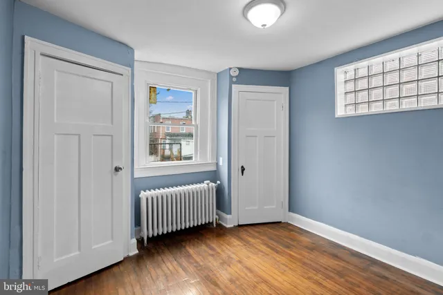 an empty room with windows