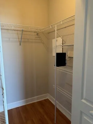 a view of a room with racks on the wall