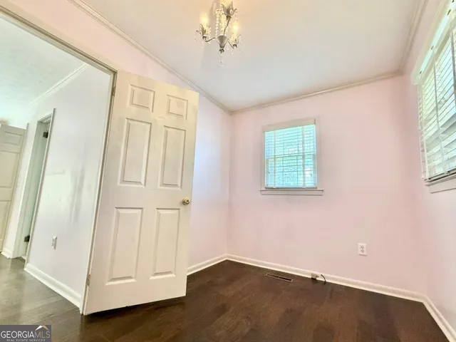 a bathroom with a toilet and a sink