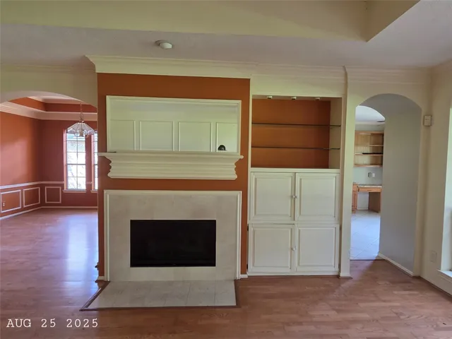 a living room with a fireplace