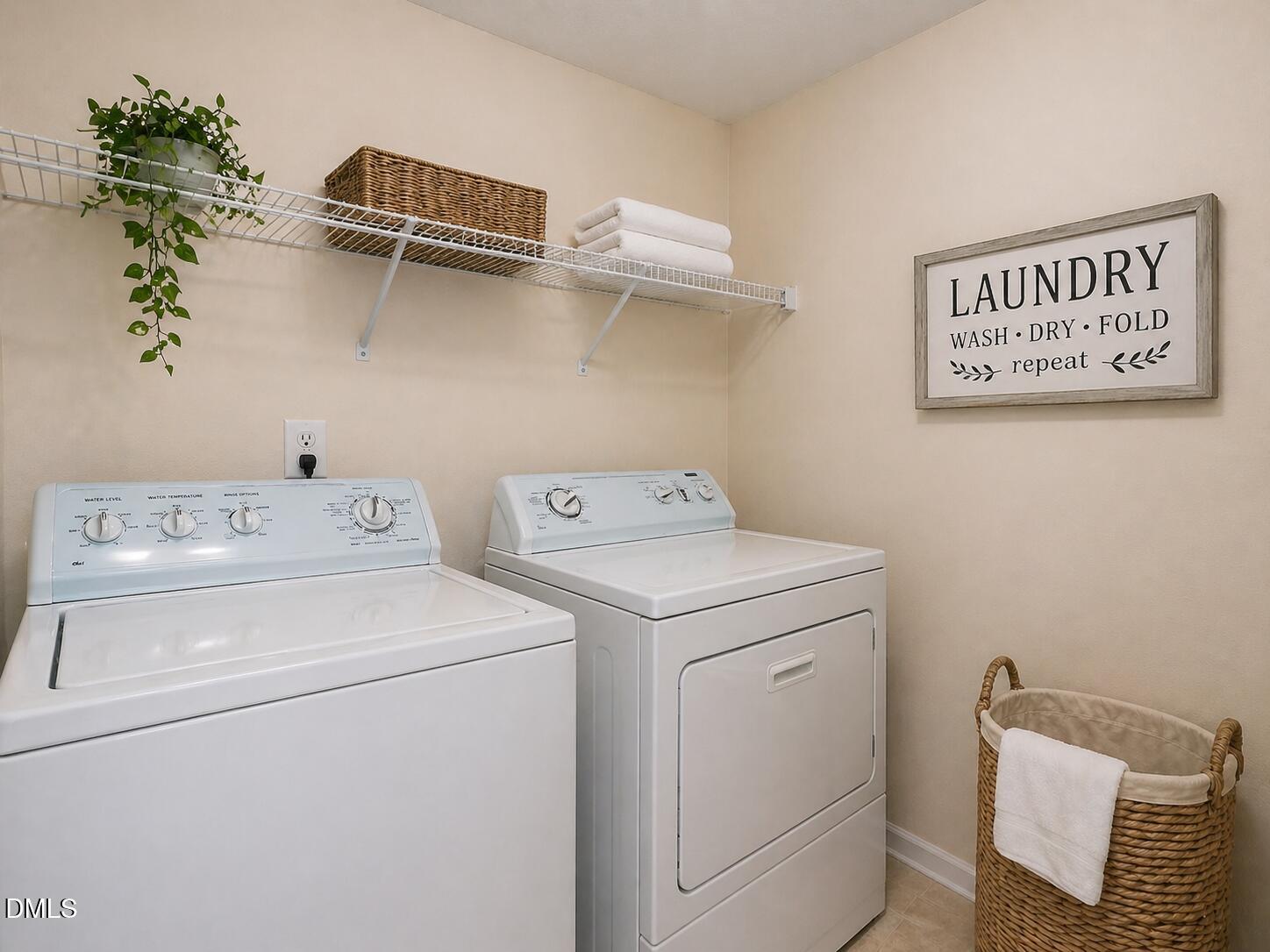 5539 Nur Lane Raleigh, NC 27606 - Photo 19 of 20 a utility room with dryer and washer