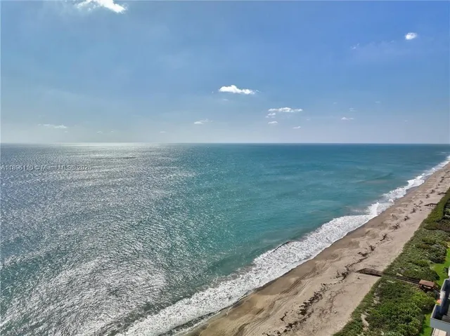 a view of an ocean beach and an entryway
