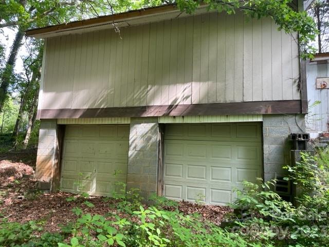 2363 Coley Pond Road Newton, NC 28658 - Photo 16 of 17 a small hut with trees in the background