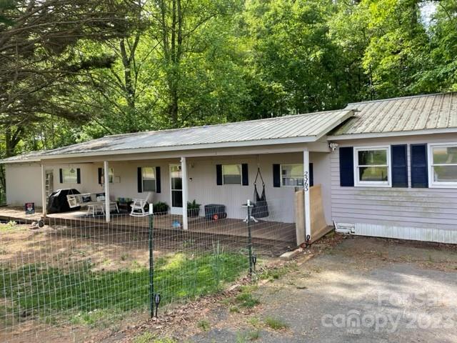 2363 Coley Pond Road Newton, NC 28658 - Photo 2 of 17 a front view of a house with garden