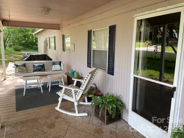2363 Coley Pond Road Newton, NC 28658 - Photo 3 of 17 a view of a dining room with furniture window and outside view