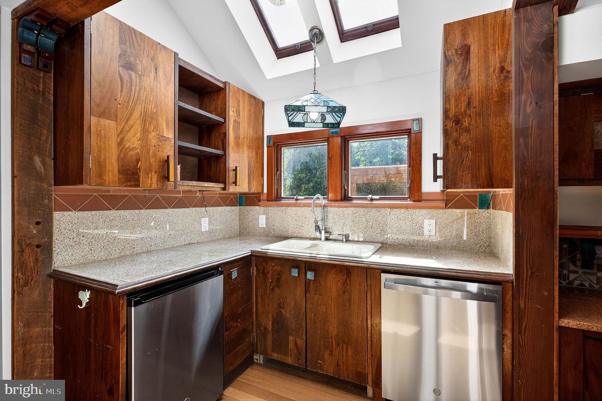 498 Perrineville Road Robbinsville, NJ 08691 - Photo 13 of 59 a kitchen with a sink and a window