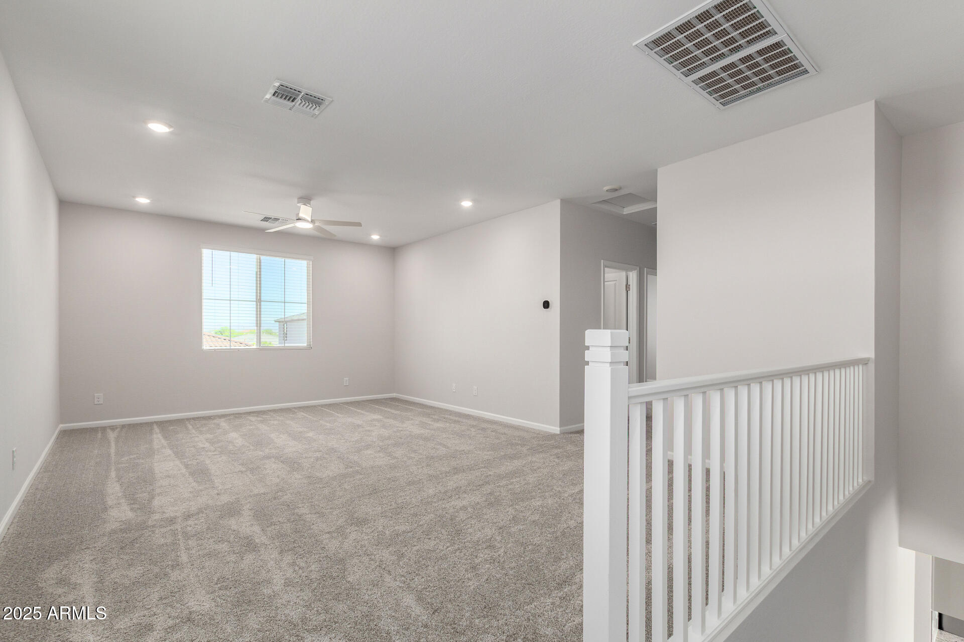 18207 West Daley Lane Surprise, AZ 85387 - Photo 19 of 40 a view of an empty room