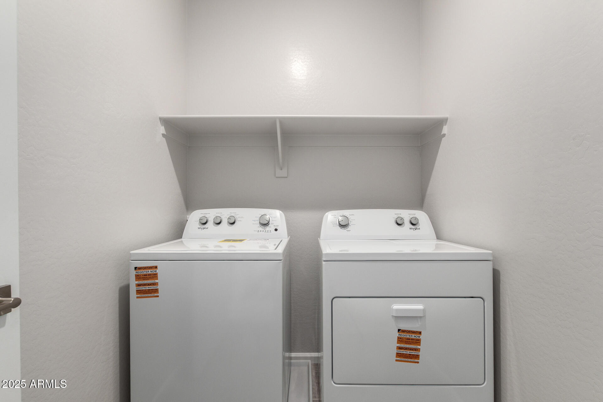 18207 West Daley Lane Surprise, AZ 85387 - Photo 35 of 40 a utility room with dryer and washer