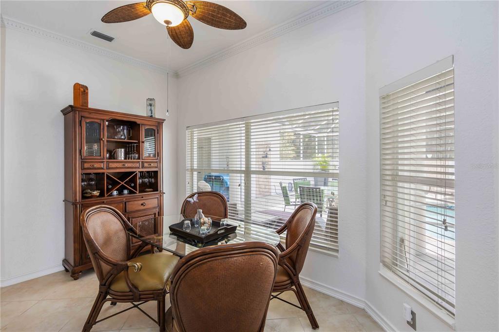 48 Bunker Road Rotonda West, FL 33947 - Photo 24 of 59 a view of a workspace with furniture and a window