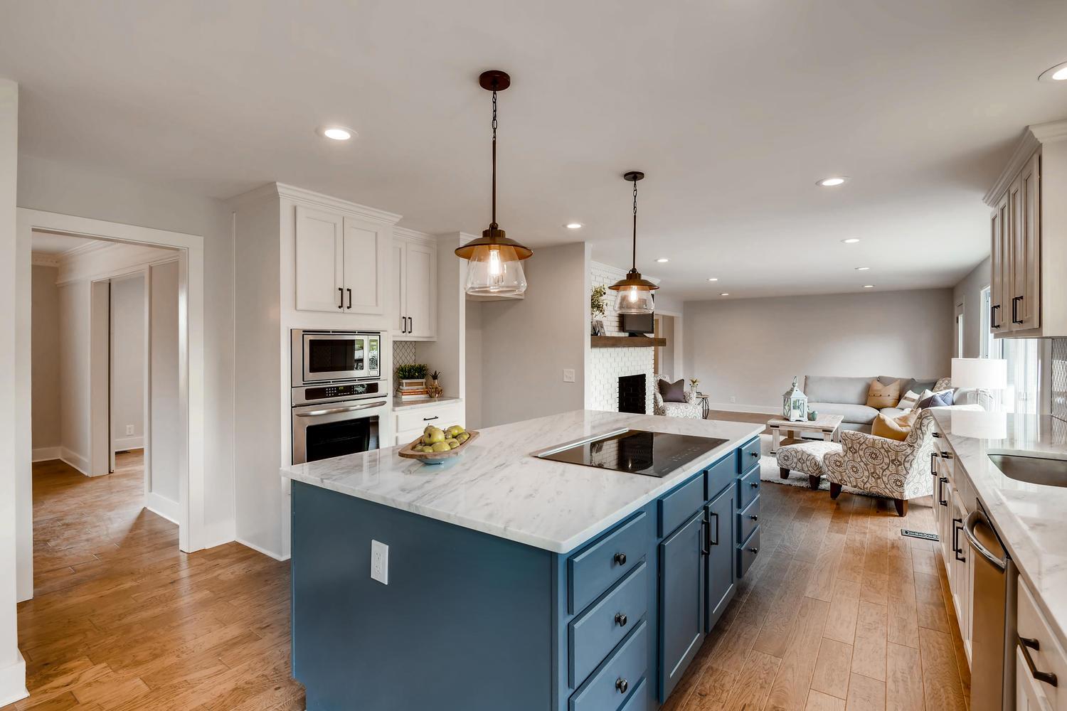 2213 Bowman Road Franklin, TN 37064 - Photo 2 of 28 beautiful two tone color scheme featuring quartz countertops and stainless steel appliances in kitchen!