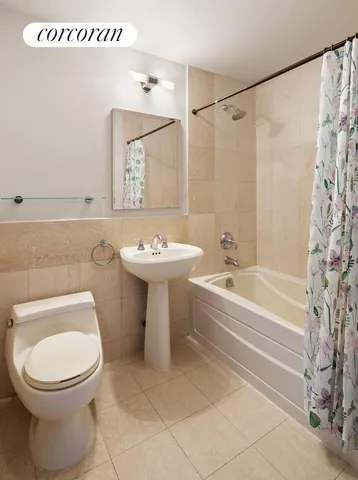 a bed room with a bed and a large window