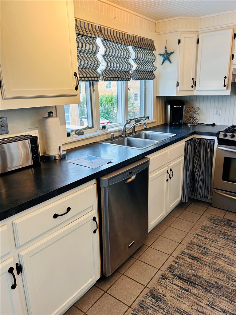 Kitchen, also has W/D, fridge, etc.
