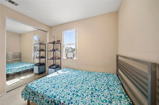 a bathroom with a sink vanity granite and toilet