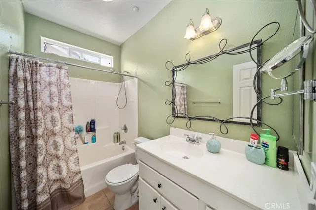 a bedroom with a bed and furniture