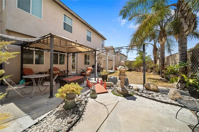 a view of a house with a patio