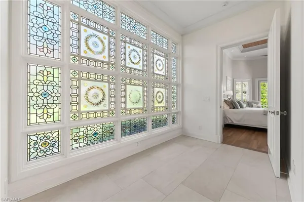 a view of a dining room with furniture window and outside view